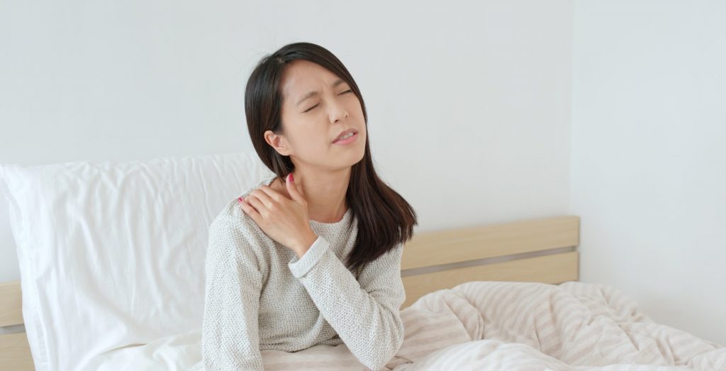 Woman Struggling With Shoulder Pain